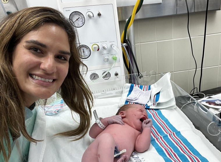 Dr. Zaskia Rodriguez, here with one of her little patients born before the storm, made a perilous journey during Hurricane Fiona to deliver a baby.