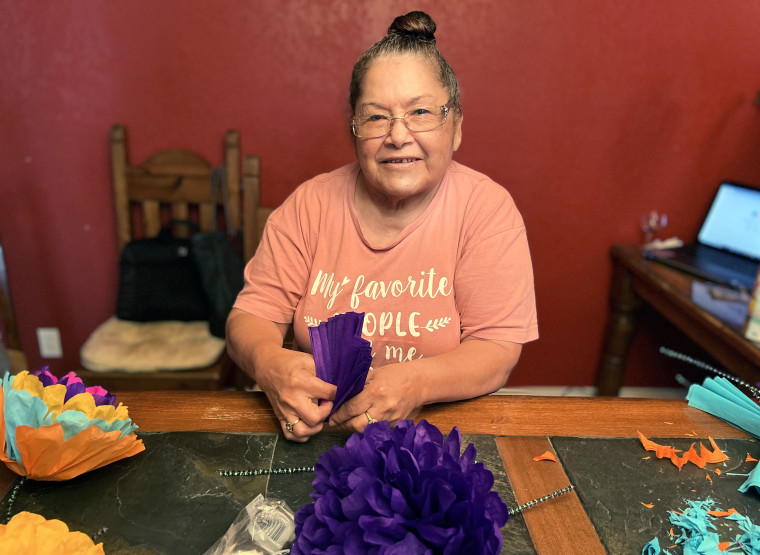 Jackie's abuelita, Paulita Cazares, making flowers for Día De Los Muertos.
