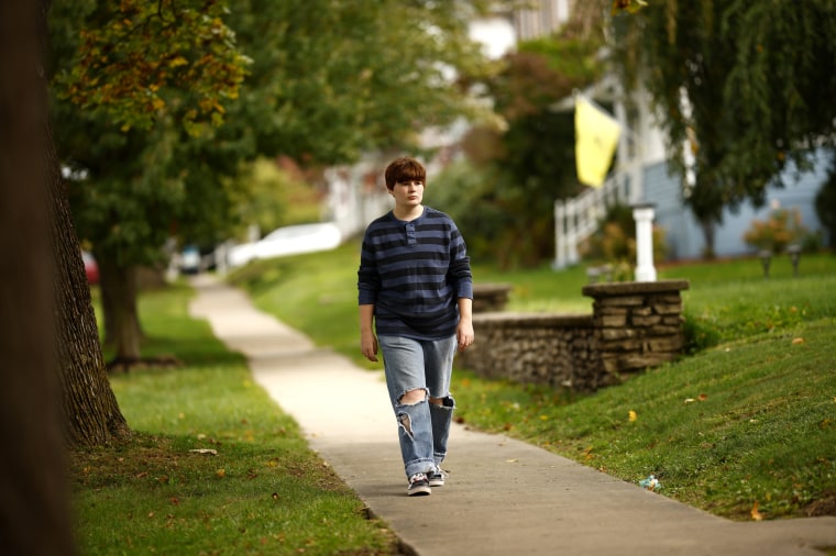 Image: Marshall Troese walks the route from his school to the University Korner gas station on in Clarion, Pa.