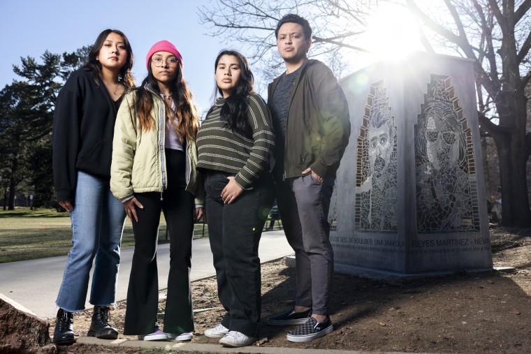 Members of the University of Colorado student group United Mexican American Students y MEXA, from left: Sonia Espinosa, Jaqueline Rangel, Jessica Valadez Fraire and Mateo Vela stand next to Los Seis de Boulder monument on campus in Boulder on April 7.