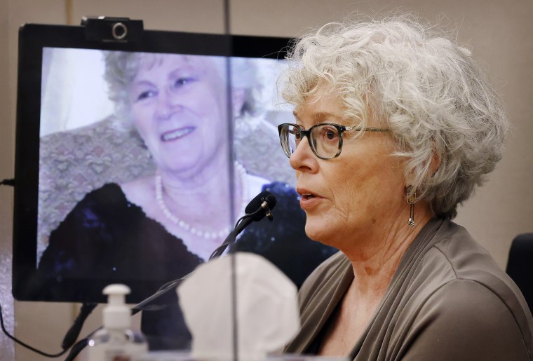 Ann Brooks speaks about her slain mother, Mary Brooks, as a photo of her mother is displayed during the murder trial of Billy Chemirmir in Dallas on Nov. 17. 
