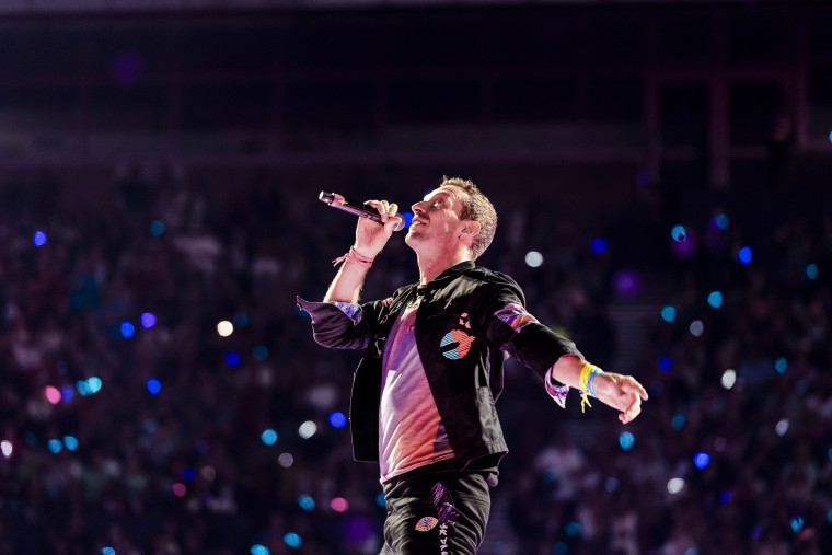 Chris Martin of Coldplay performs on Aug. 23, 2022, in Glasgow, Scotland.