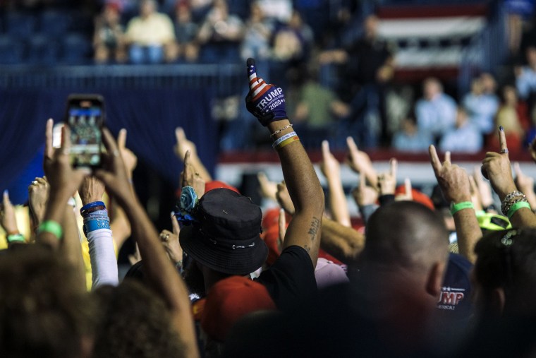 Image: The crowd holds up their index fingers at a campaign rally hosted by former President Donald Trump in support of Ohio Senate candidate JD Vance in Youngstown on Sept. 17, 2022.