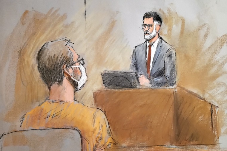 In this courtroom drawing, defendant Kaleb Franks listens to Assistant U.S. Attorney Nils Kessler during a hearing in federal court in Grand Rapids, Mich., on Oct. 16, 2020.