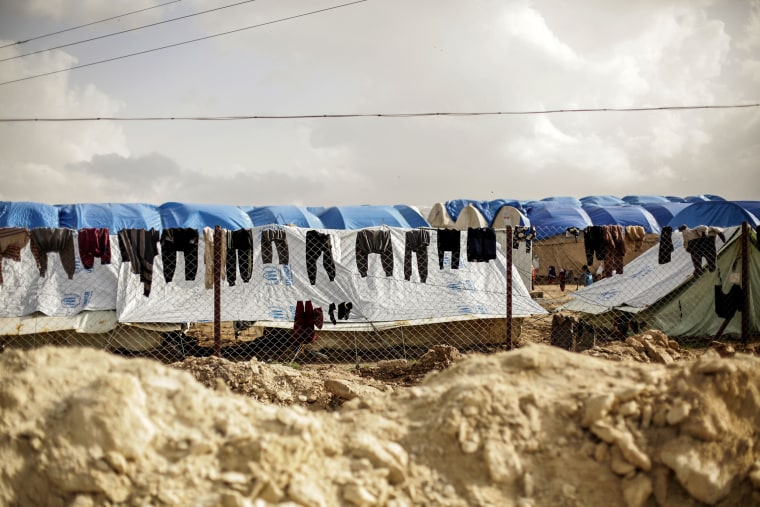 Laundry dries on a chain-link fence at al-Hol camp, in the section where foreign families from Islamic State-held areas are housed, Hasakeh province, Syria on March 31, 2019.