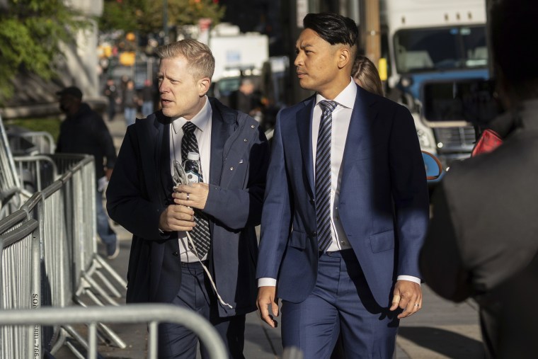 Anthony Rapp, left, arrives at court for the civil lawsuit trial against Kevin Spacey on Oct 6, 2022, in New York.  