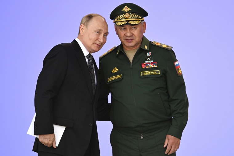 Russian President Vladimir Putin and his Defense Minister Sergei Shoigu.