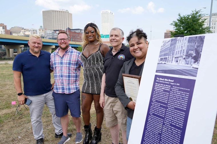 Michail Takach, left, of the Wisconsin LGBTQ History Project; Dr. Brice Smith, second from left, of the Wisconsin Transgender Oral History Project; Elle Halo, center, of Diverse & Resilient; Don Schwamb, second from right, of the Wisconsin LGBTQ History Project; and Jocasta Zamarripa, right, of the Milwaukee Common Council.