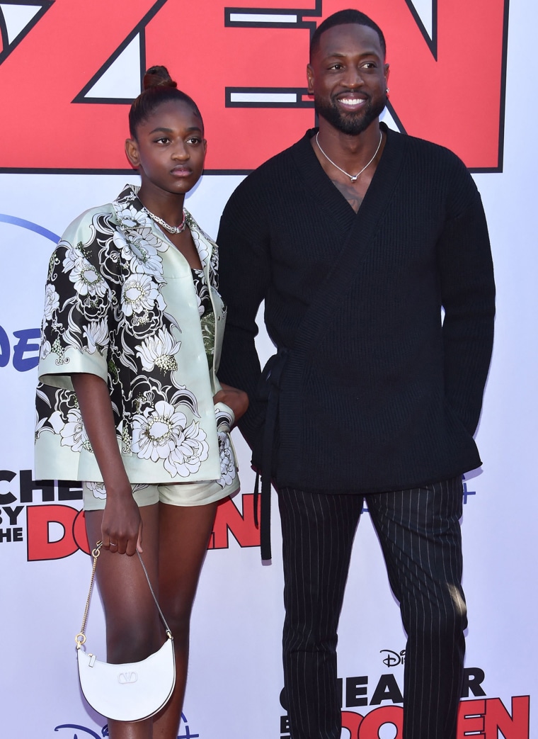 Dwayne Wade and his daughter Zaya Wade arrive for the "Cheaper by the Dozen" Disney premiere in Hollywood, Calif.,
