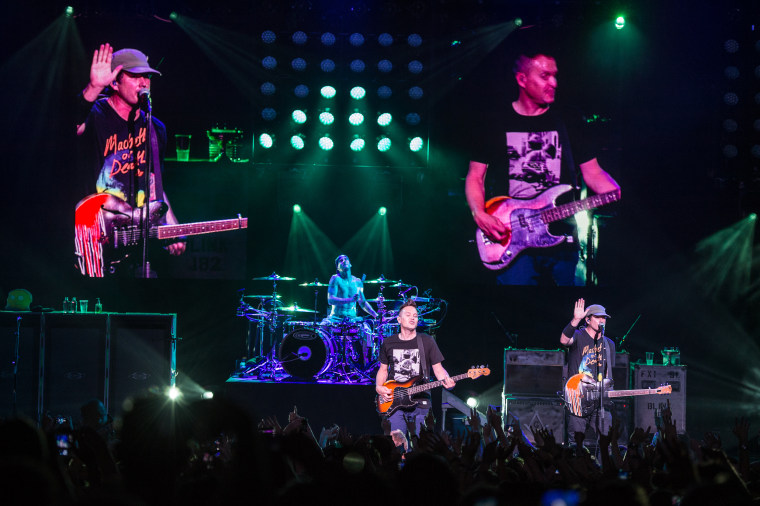 Travis Barker, Mark Hoppus and Tom DeLonge of Blink-182 perform in London in 2014.