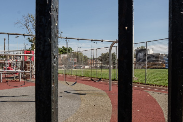 An empty playground with swings in Philadelphia.