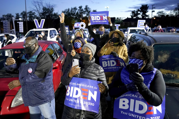 Supporters listen as Democratic presidential candidate former Vice President Joe Biden speaks at a drive-in campaign rally at Lexington Technology Park, in Pittsburgh, on Nov. 2, 2020.
