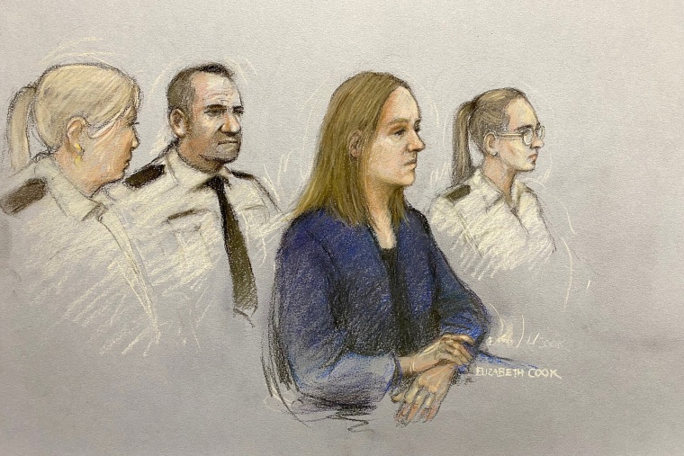 Lucy Letby appears at Manchester Crown Court, in Manchester, England, on Monday Oct. 10, 2022. Letby, 32, has been charged with murder in the deaths of five baby boys and two girls, and the attempted murder of five boys and five girls, while she worked at the Countess of Chester Hospital in northwest England between 2015 and 2016.