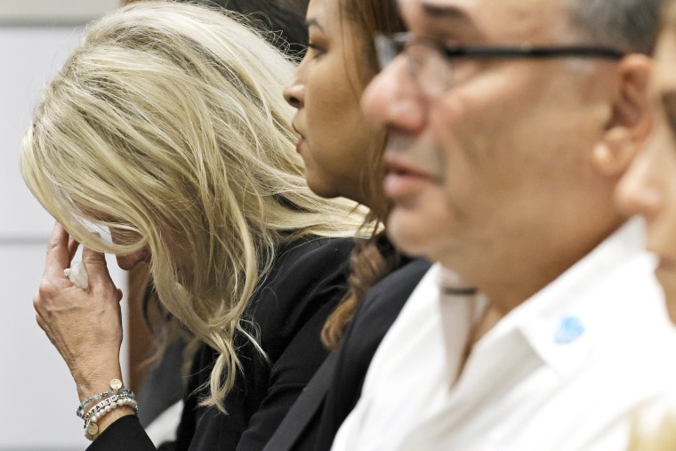 Gena Hoyer reacts as she hears that her son's murderer will not receive the death penalty as the verdicts are announced in the trial of Marjory Stoneman Douglas High School shooter Nikolas Cruz at the Broward County Courthouse, in Fort Lauderdale, Fla., on Oct. 13, 2022,  Hoyers son, Luke, was killed in the 2018 shootings. Cruz, who plead guilty to 17 counts of premeditated murder in the 2018 shootings, is the most lethal mass shooter to stand trial in the U.S. He was previously sentenced to 17 consecutive life sentences without the possibility of parole for 17 additional counts of attempted murder for the students he injured that day.
