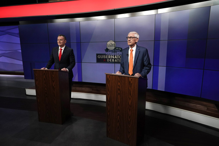 Wisconsin Republican gubernatorial candidate Tim Michels, left, and Democratic gubernatorial candidate Tony Evers before their televised debate on Friday, Oct. 14, 2022, in Madison, Wisc.