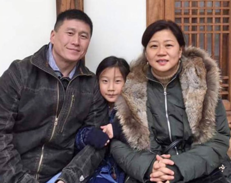 Grady Kurpasi with his wife, Heeson Kim, and their daughter.