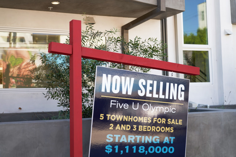 A "for sale" sign outside a building in Los Angeles.
