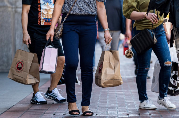 Shoppers carry bags in San Francisco