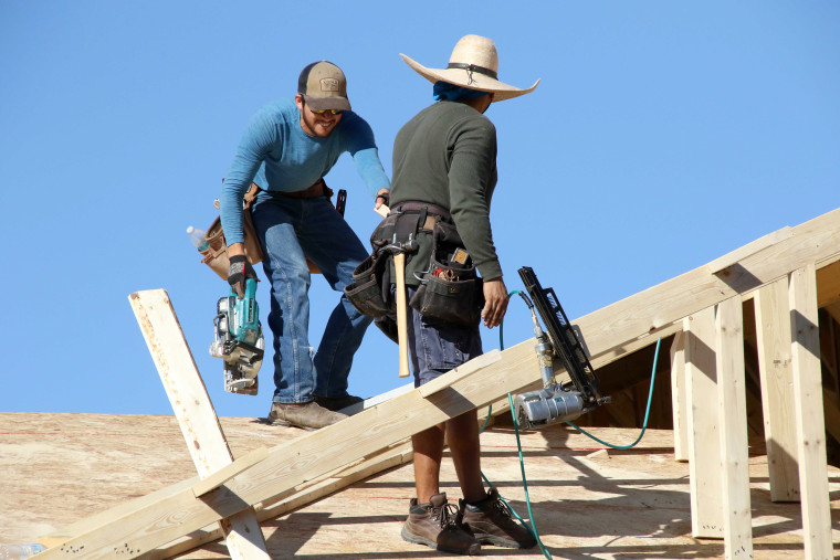 Construction of the new subdivision Monteluna, by Blanford Homes is under way in Mesa, Arizona, on Nov. 8, 2021. The metro Phoenix area is in the midst of a housing shortage that is pushing up home prices, and housing needed for the Valley's rapidly growing population is taking longer to build due to labor and material shortages.