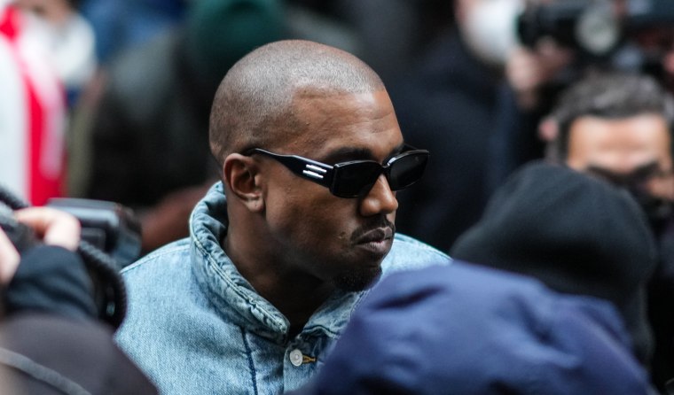 Kanye West outside Kenzo, during Paris Fashion Week in France, on Jan. 23, 2022.