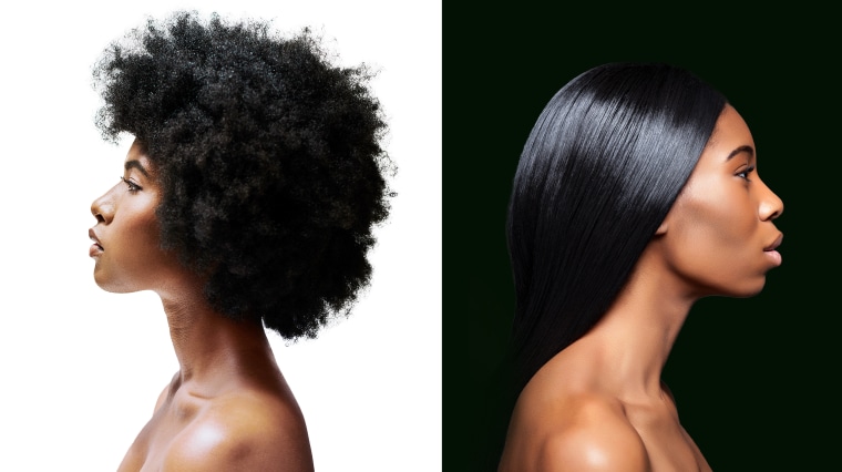 Two black women, one with an afro and another with relaxed hair.
