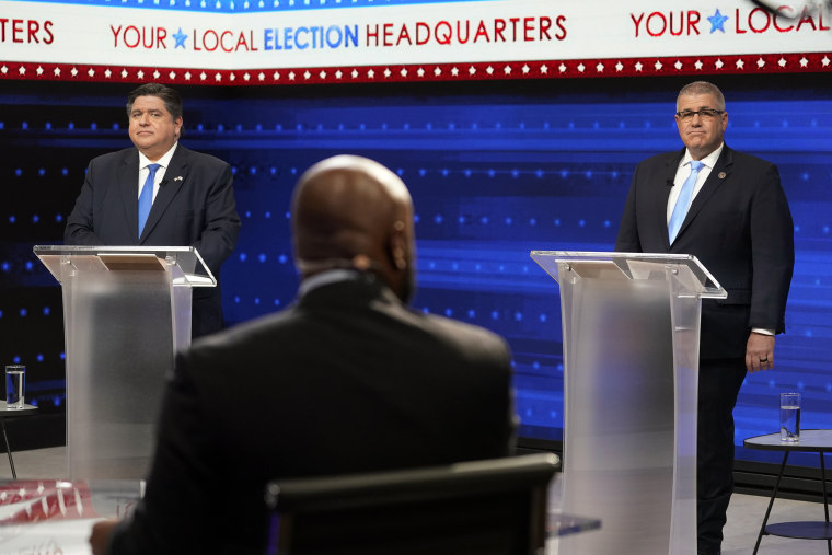 Illinois Gov. JB Pritzker, left, and Republican gubernatorial challenger state Sen. Darren Bailey participate in the Illinois Governor's Debate at the WGN9 studios, Tuesday, Oct. 18, 2022, in Chicago.