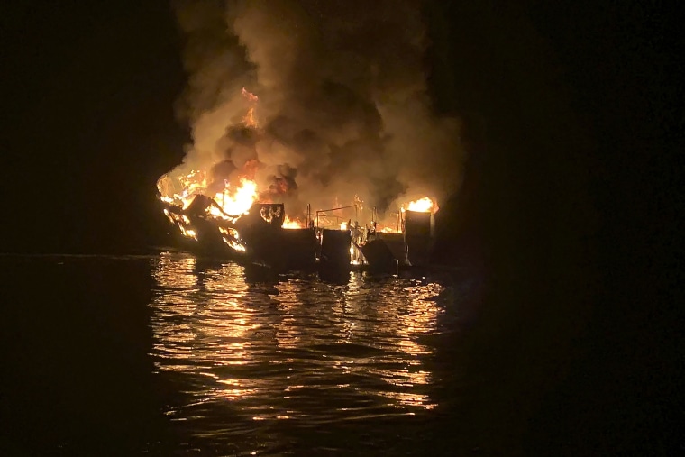 In this Sept. 2, 2019, file photo provided by the Santa Barbara County Fire Department, the dive boat Conception is engulfed in flames after a deadly fire broke out aboard the commercial scuba diving vessel off the Southern California Coast. The captain of a scuba diving boat that burned and sank off the California coast, killing 34 people below deck, has pleaded not guilty to federal manslaughter charges. Jerry Boylan surrendered Tuesday, Feb. 16, 2021, and was arraigned in Los Angeles federal court on 34 counts of seaman's manslaughter.