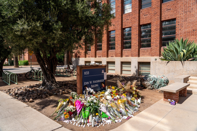 Flowers at a makeshift memorial for Dr. Thomas Meixner at the University of Arizona in Tucson on Oct. 8, 2022.