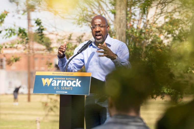 Sen. Rev. Raphael Warnock speaks during a campaign event