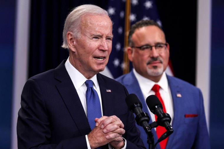 President Joe Biden speaks about student debt relief alongside Secretary of Education Miguel Cardona on Oct. 17, 2022, in Washington.