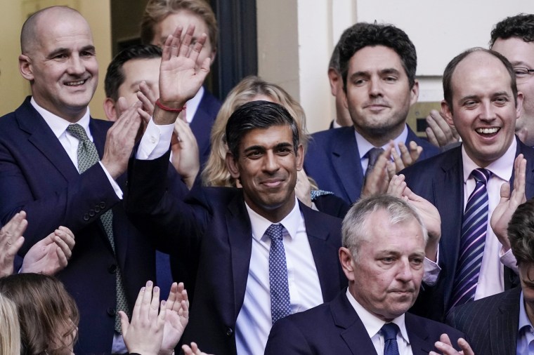 Rishi Sunak waves aft  winning the Conservative Party enactment    contention   astatine  the Conservative enactment      Headquarters successful  London connected  Oct. 24, 2022.