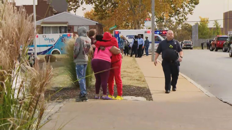 Emergency personnel at the scene of a possible school shooting in St. Louis, Mo.