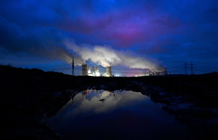 The cooling towers of an lignite-fired power plant in Neurath, Germany, on Jan. 17, 2022. 