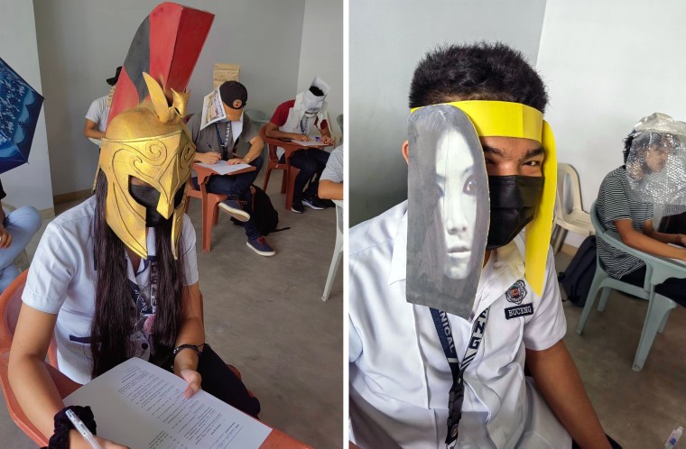 Students at Bicol University College of Engineering in Legazpi City, the Philippines, take an exam on Oct. 17, 2022, while wearing 'anti-cheating hats' they designed as part of an assignment