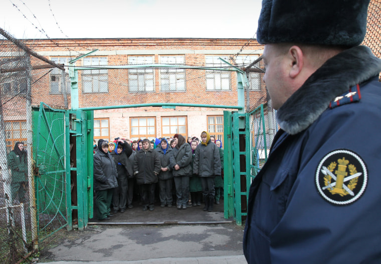 Imprisoned women wait to be escorted for work at a women's prison outside the city of Orel, central Russia, in 2011.