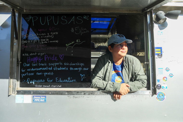 Cecilia Polanco in the window of her Pupusa truck in Durham, N.C., on Oct. 22, 2022. 