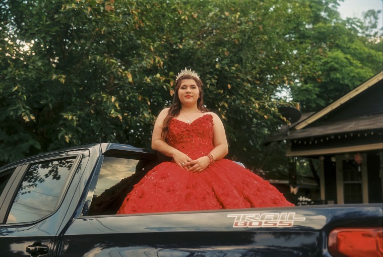 Youth leader Mirella Arianna Lupe Mena in a pickup truck that will ride to the polls.