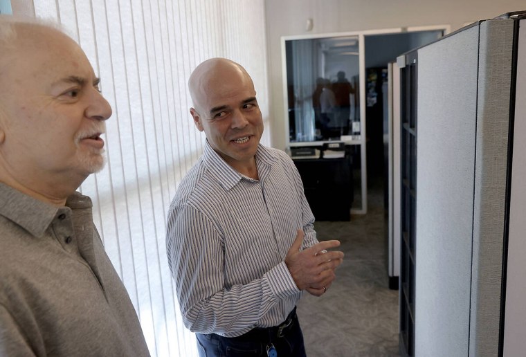 Robert Telles, right, with Jeff German in his Las Vegas office on May 11, 2022.