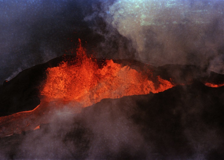 Molten rock flows from Mauna Loa on March 28, 1984, near Hilo, Hawaii.