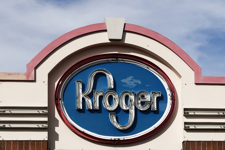 Image: A Kroger logo on October 15, 2022. A subsidiary of Kroger, the supermarket and retail store company, must pay $180,000 to two former employees who were fired in 2019 after they refused to wear logos they thought resembled a Pride flag.