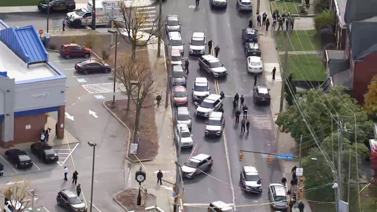 The scene outside a church where officers said "multiple shots" were fired in Pittsburgh on Friday.