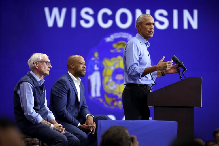 Former President Barack Obama speaks at a rally with Wisconsin Governor Tony Evers, left, and Democratic candidate for U.S. Senate in Wisconsin Mandela Barnes on October 29, 2022 in Milwaukee, Wisconsin. 