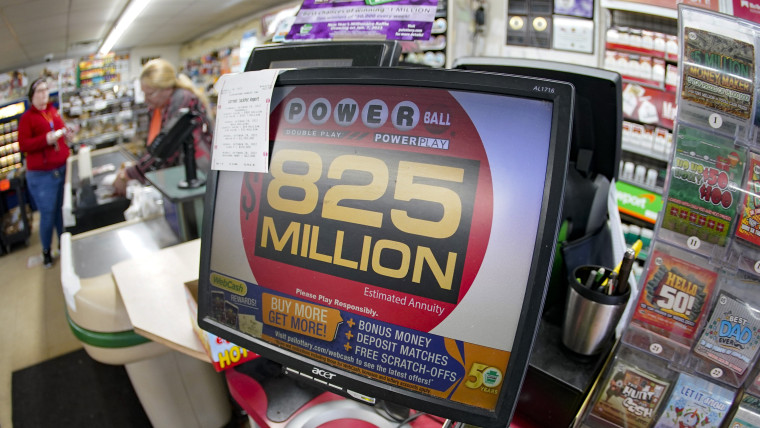 A lottery ticket display at a market in Prospect, Pa., shows the jackpot amount for the Saturday, Oct. 29, drawing of the Powerball lottery, Friday, Oct. 28, 2022.