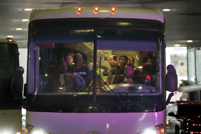 Migrants arrive on a bus from Texas at New York's Port Authority  on Sept. 22, 2022.