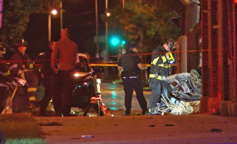 Milwaukee police officers and firefighters responded to the scene after a car involved in a police pursuit fell 35 feet off a bridge and caught fire.