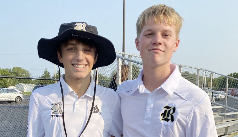 At tennis practice, Drew Strasser, left, grabbed a wall and then collapsed. Friend and teammate Jake, right, started CPR while their coach got a defibrillator.