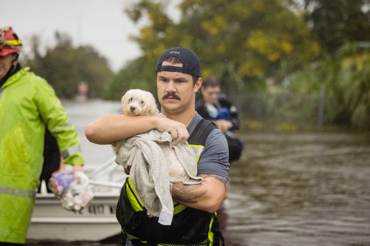 Rescuers were not willing to leave any people or pets behind.  