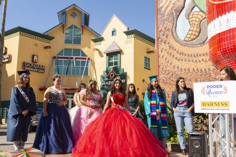 Young women dressed in their quince dresses for the event. 