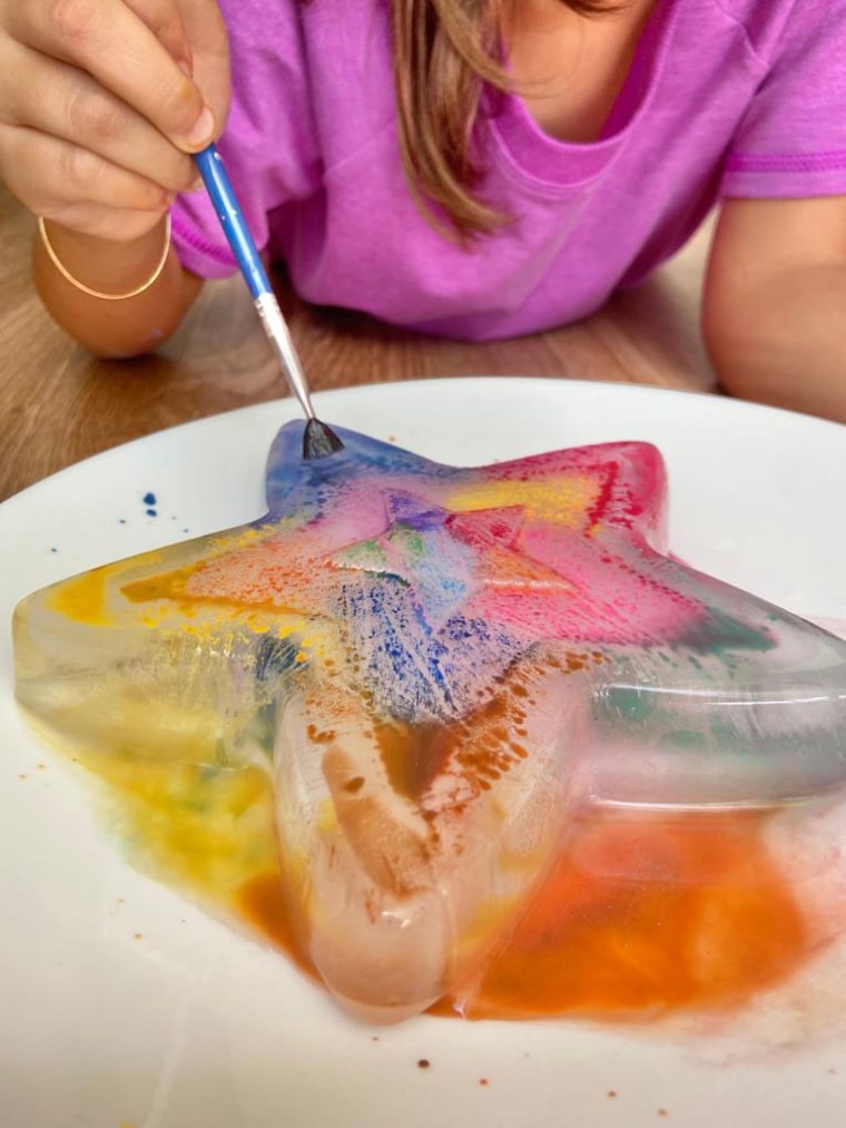 child painting on a star