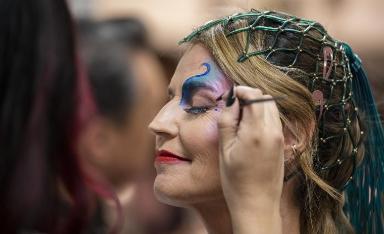 Savannah Guthrie gets her makeup applied for the Halloween reveal show. She dressed up as a Cirque Du Soleil dancer.